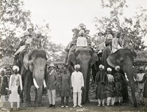 Ears Collection: Travellers riding elephants in India, c. 1900