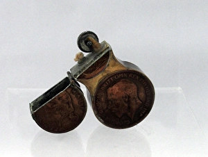 Images Dated 14th February 2012: Trench Art lighter in the shape of the number eight