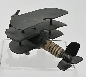 Trench Art triplane - a sparkplug fuselage and metal wings