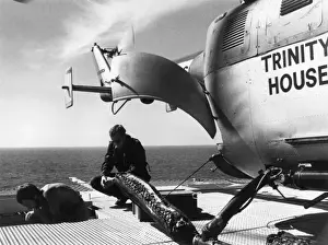 Lighthouse Prints: Trinity House Service Helicopter on Bishop Rock lighthouse