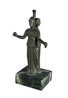 Triple form of Hecate around a column. Ancient Greek