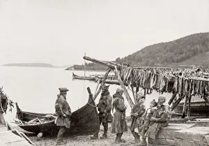 Tromso, Norway, fishermen with drying fish