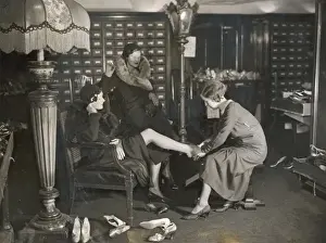 Trying on Shoes / Photo