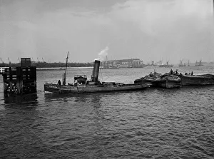 The tug Lizard on the River Thames, Woolwich, SE London