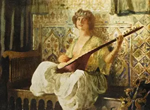 Tukish woman playing the lute in the Harem