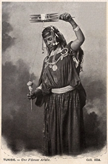 Spin Gallery: A Tunisian Arab Woman spinning wool using a hand spindle