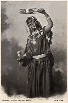 Spins Prints: A Tunisian Arab Woman spinning wool using a hand spindle