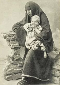 Turkish beggar woman with baby