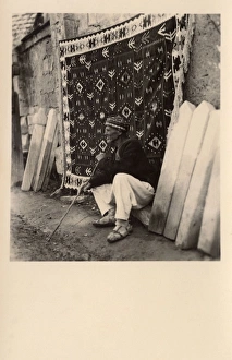 Amid Gallery: Turkish carpet seller amid tombstones