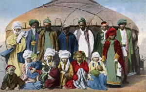 Turkmenistan - Family group standing in front of their yurt