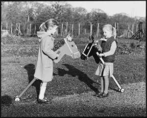 Twins on Hobby Horses