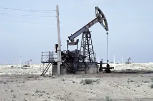 Deserts Prints: A typical oil-pump - oil-well in a desert