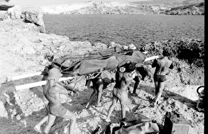 Anchored Prints: Underwater house being carried, Malta