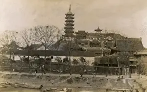 Unidentified Chinese Pagoda and riverside buildings