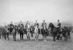Uniformed Prints: Uniformed men on horseback in a field