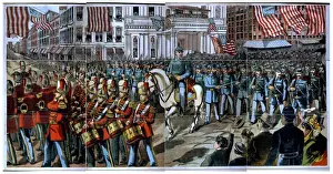 Union soldiers and band marching through a city street on th