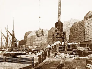 Unloading pulp, London docks