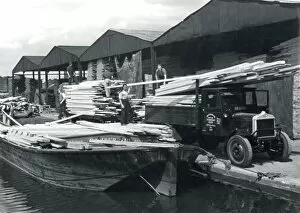 Images Dated 25th January 2011: Unloading Timber 1930S