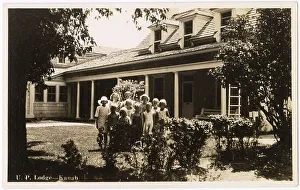 U.P. Lodge, Kanab, Kane County, Utah, USA, with a group of children on the lawn. The lodge was midway between Grand Canyon (Arizona) and Bryce Canyon (Utah). Date: 1930s