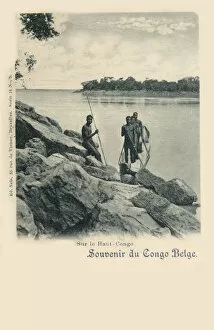 Upper Congo, Africa - Four tribesmen and their dugout canoe