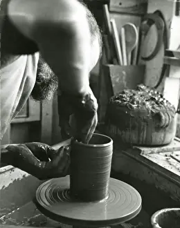 Ceramics Prints: USING POTTERS WHEEL