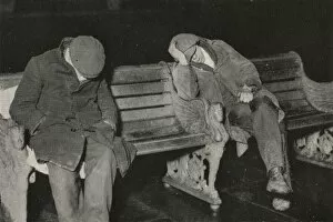 Tramps Gallery: Vagrants asleep on bench on Thames Embankment, London