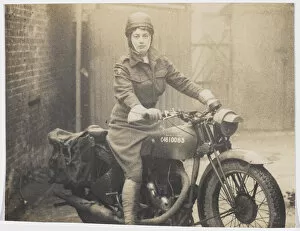 Images Dated 10th January 2013: Valerie Ryshworth-Hill in ATS uniform on a motorbike