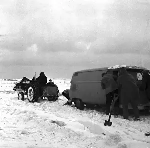 Snowfall Prints: Van and snow plough in the snow