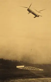 Various helicopters lifting load