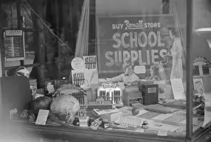 Osage Prints: Vegetables (at left) and school supplies in drug store windo