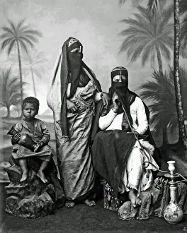 Veils Prints: Veiled women and child, with hookah, Egypt