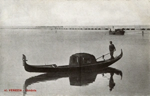Images Dated 20th April 2017: Venice, Italy - Covered gondola and the Railway Bridge