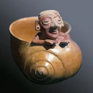 Maya Prints: Vessel shaped as a snail decorated with an old