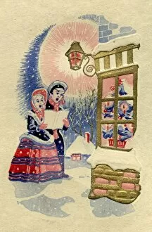 Victorian carol singers on a Christmas card