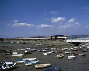Images Dated 11th April 2017: View of boats in the harbour, with train, Cockwood, Devon
