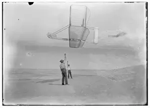 Tate Prints: Side view of Dan Tate, left, and Wilbur, right, flying the 1