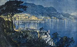 Monaco Prints: A view of Monte Carlo at night made from the high vantage point of the high gardens of Monaco looking down upon