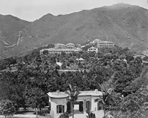 Hong Kong Prints: View across to a mountain with buildings in the foreground