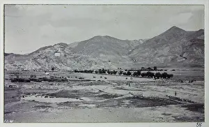 Polo Prints: View of polo ground, with fortified monastery or Dzong on a distant hillside