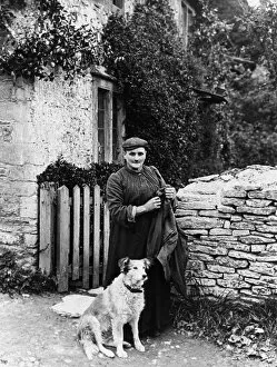 Images Dated 12th March 2018: Villager with a dog, 1890s