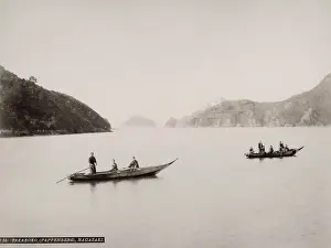 Vintage 19th century photograph: boats in the water at the entrance to Nagasaki harbour