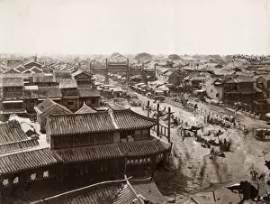 Vintage 19th century photograph: Hatamen street and pailou, paifeng, Peking, Beijing