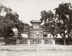 Vintage 19th century photograph: Pailou, paifeng, and street, Peking, Beijing, China