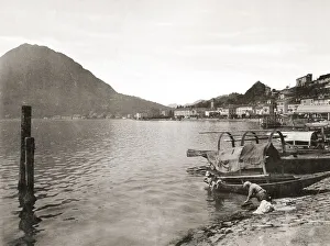 Vintage 19th century photograph - view of the shore of Lugano town and the lake Vintage 19th century photograph - view of the shore of Lugano town and the lake