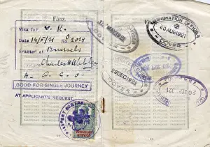 Visa pages with stamps in a French passport