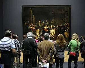 Rembrandt Collection: Visitors looking at The Night Watch by Rembrandt (1606-1669)