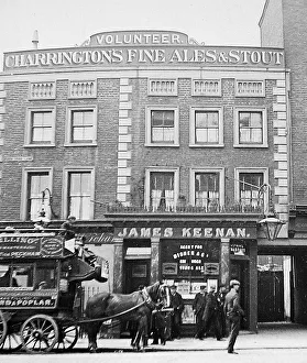 Poplar Prints: The Volunteer pub, Poplar, London and a Tilling horse bus