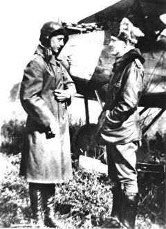 Aces Gallery: Voss, Werner on left, talking to Manfred von Richthofen