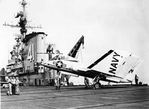 Wings Collection: Vought F7U-3 Cutlass 128454 with folded wings on USS Midwa