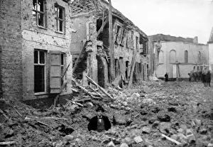A waist deep shell hole in a Belgian Street: In a war wrecke
